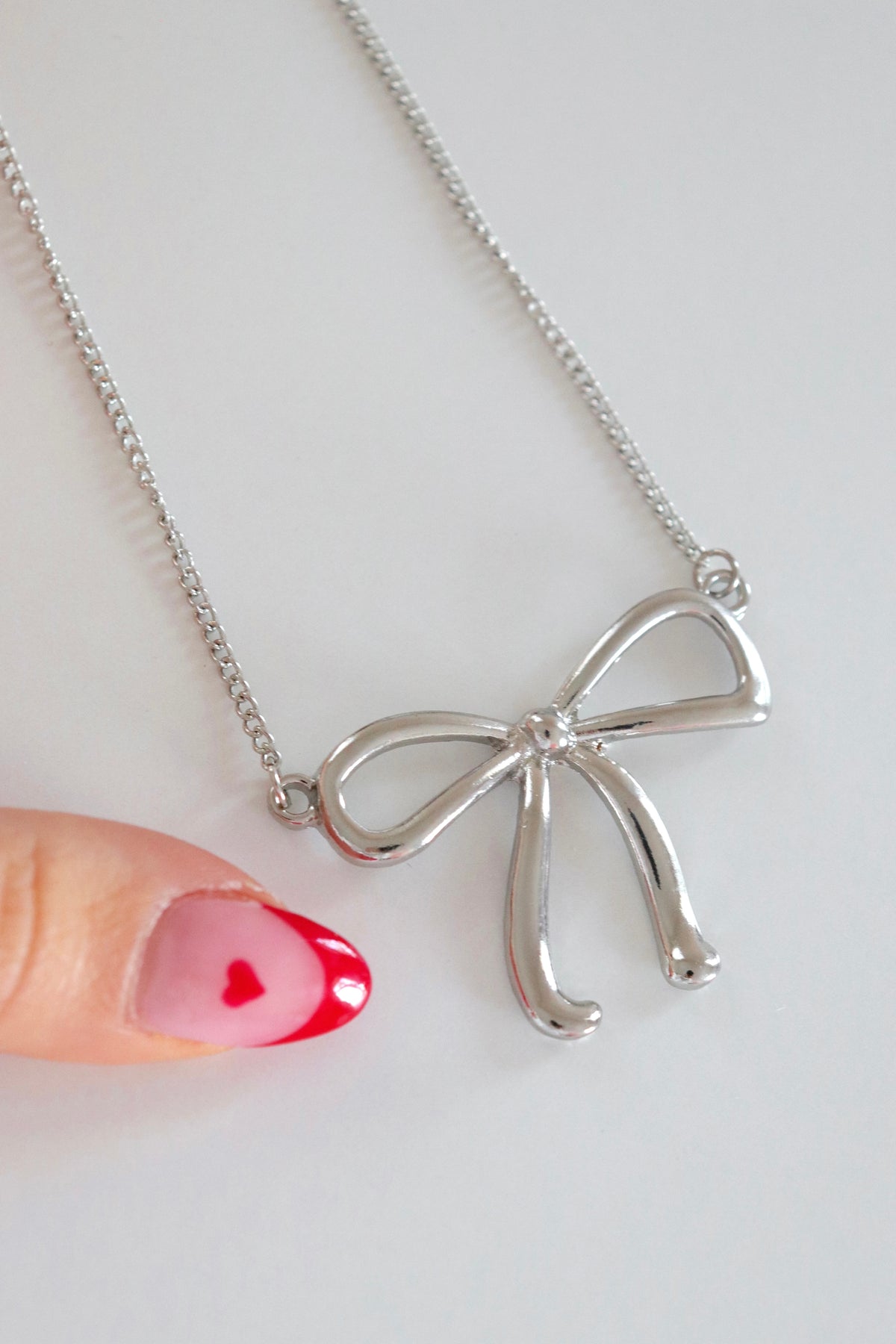 Large Silver Bow Necklace