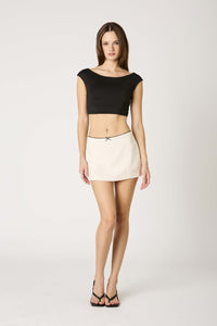 All Talk Cream Bow Mini Skirt