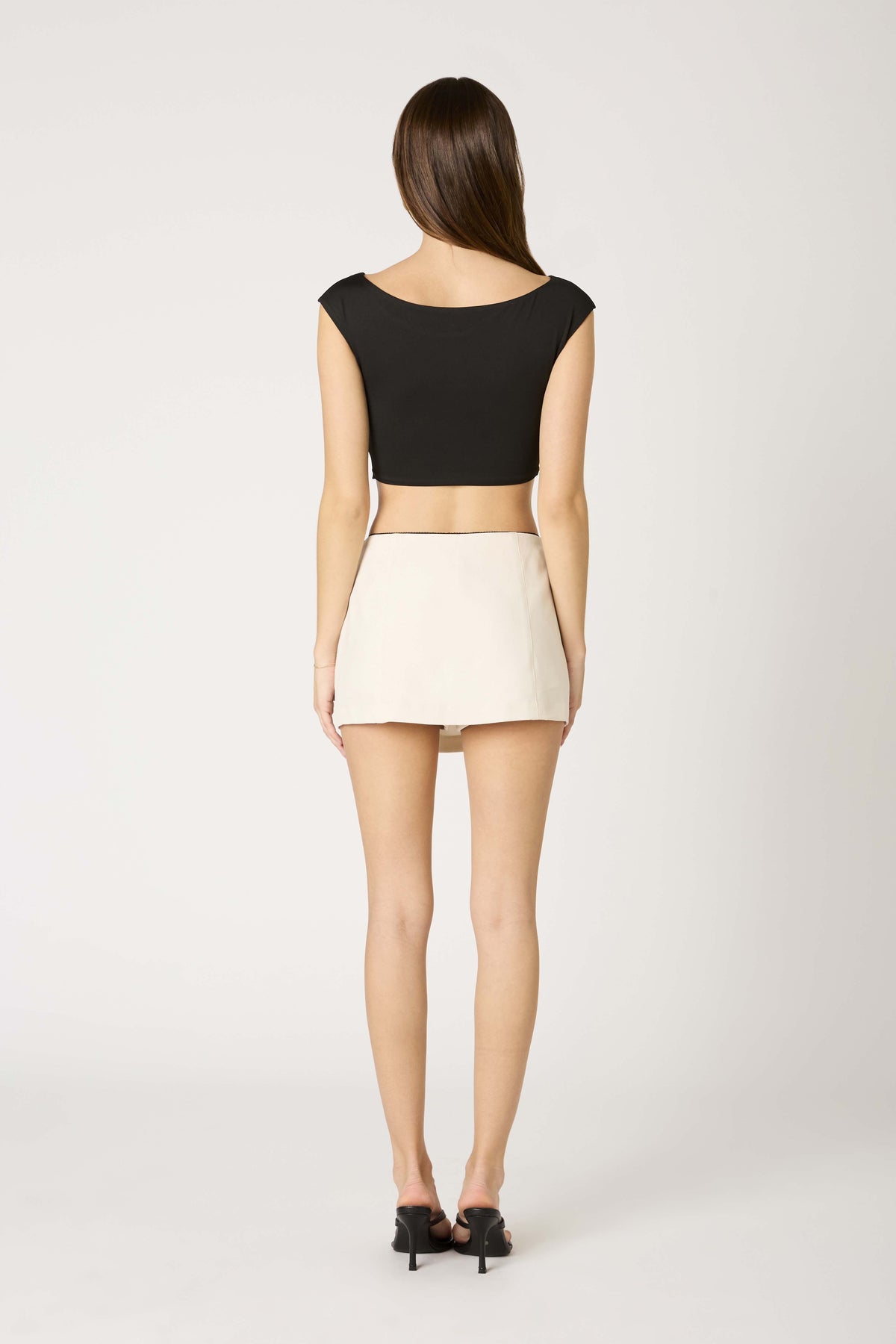 All Talk Cream Bow Mini Skirt